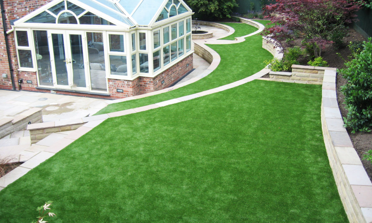 large back garden with artificial grass