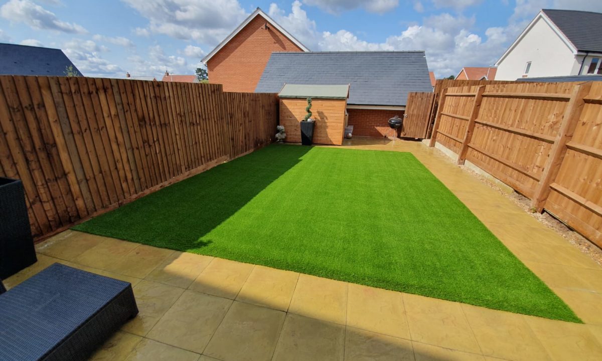 back garden after the artificial glass installation