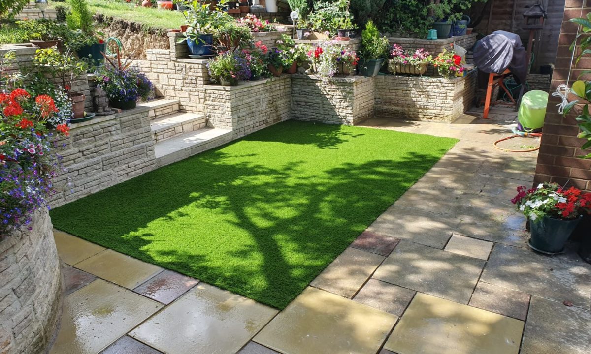 garden after artificial glass installation