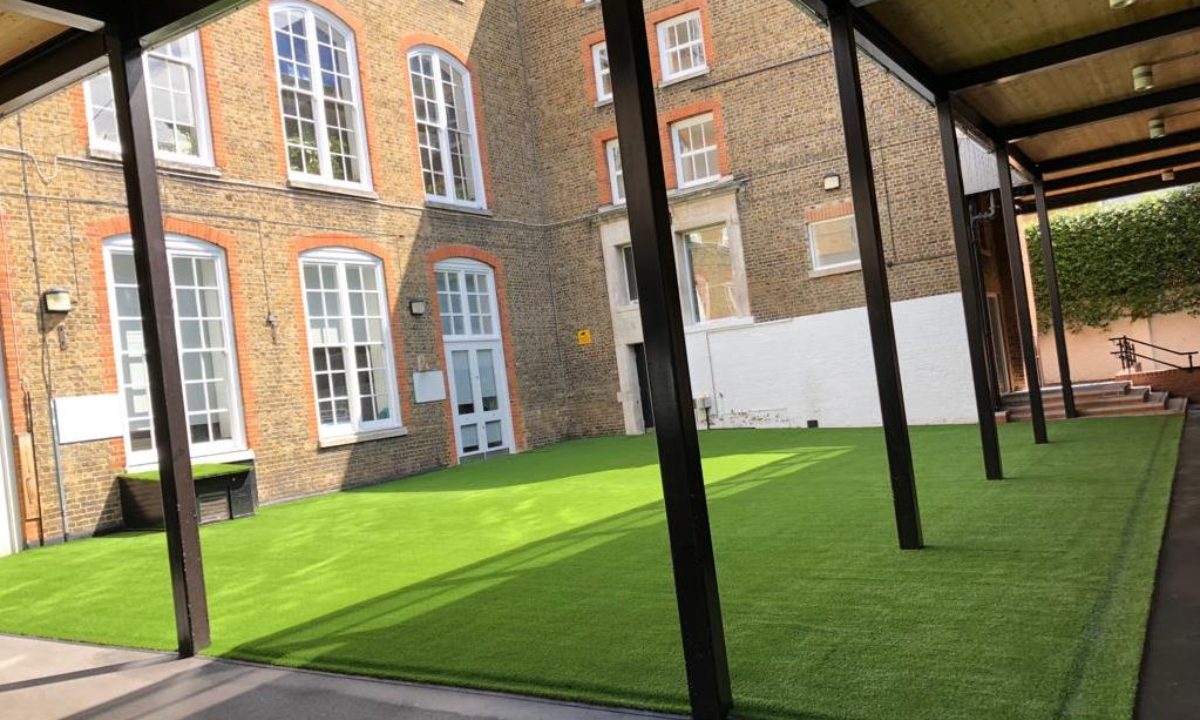 Courtyard with artificial grass at primary school